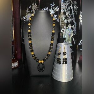 Handmade black glass gold tone beaded necklace and earring set